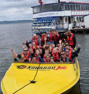 A group enjoying a Jet boat ride in New Zealand. Photo: Horizons Sports Tours