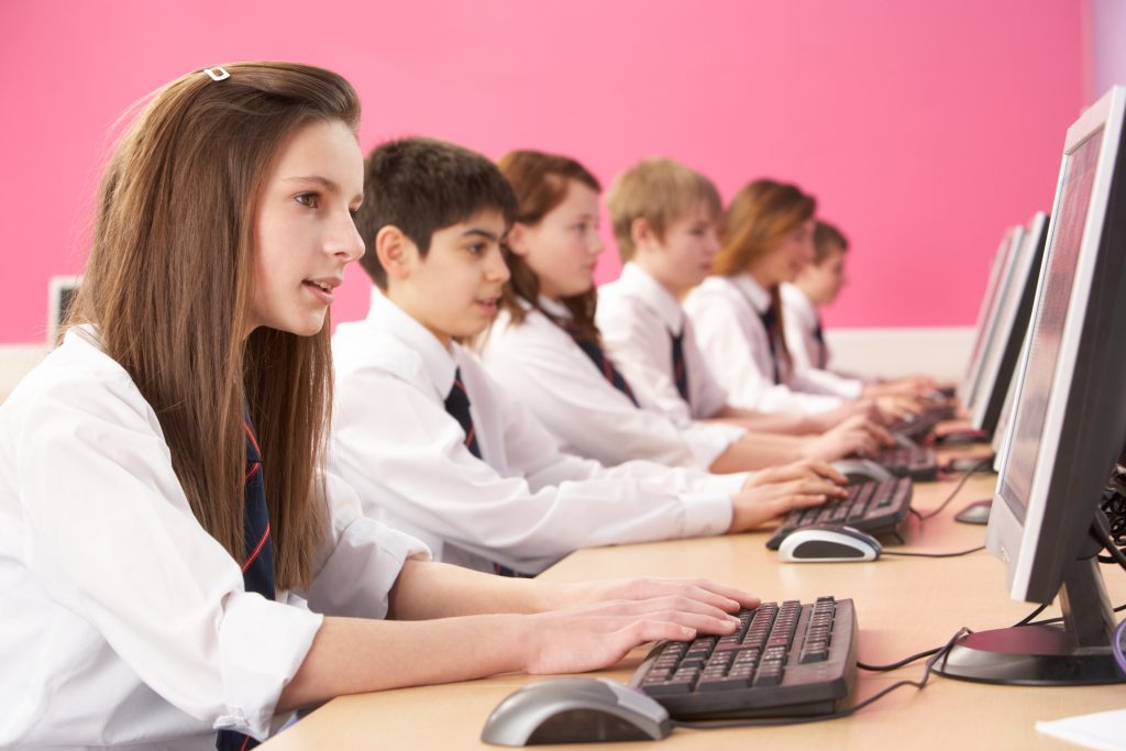 eenage Students In IT Class Using Computers In Classroom