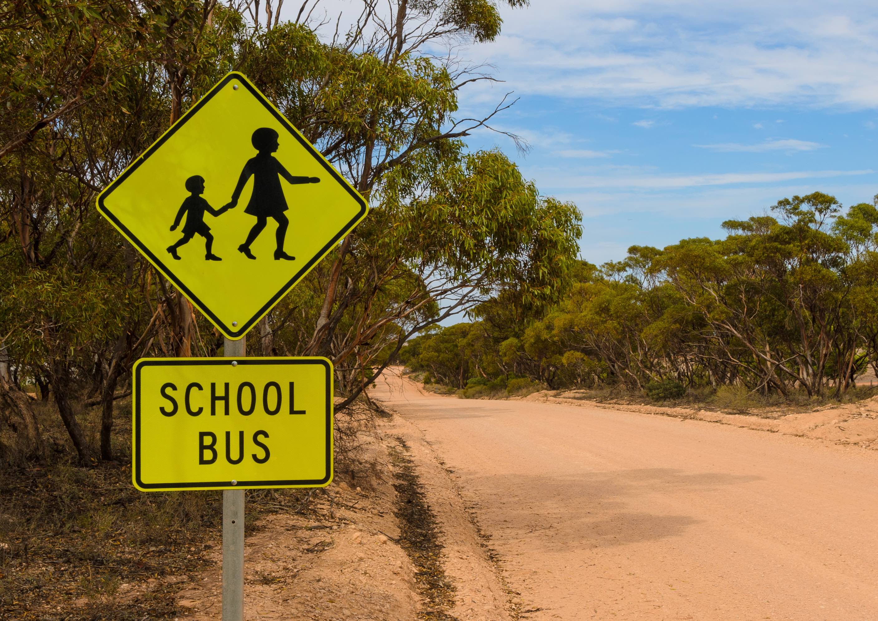 School bus stop warning road sign Australian rural outback