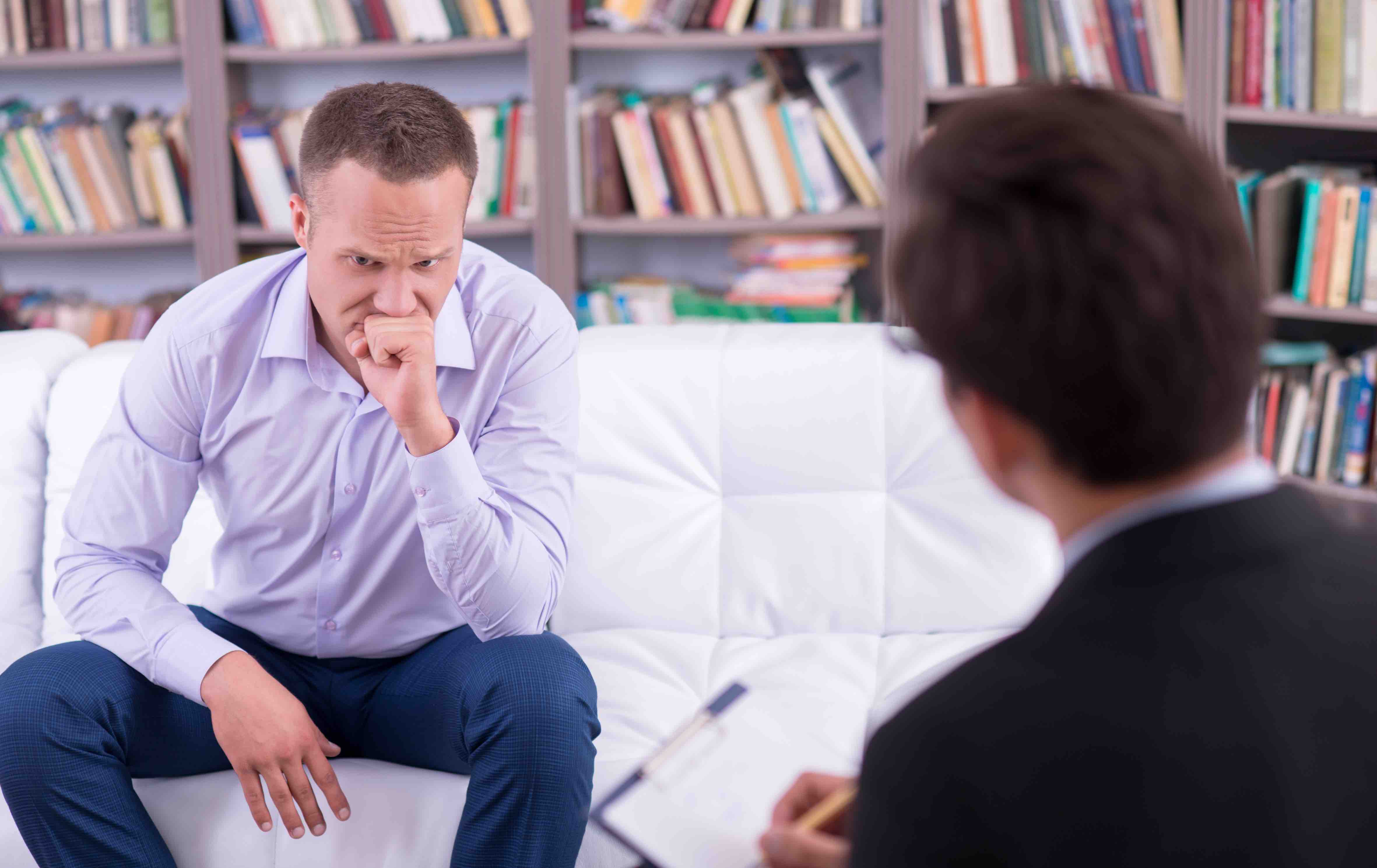 Depressed principal talking to his psychologist
