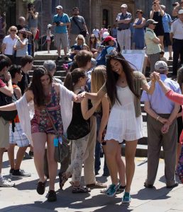 Students try folk dancing near Catedral de Barcelona in Spain. Photo credit: WorldStrides