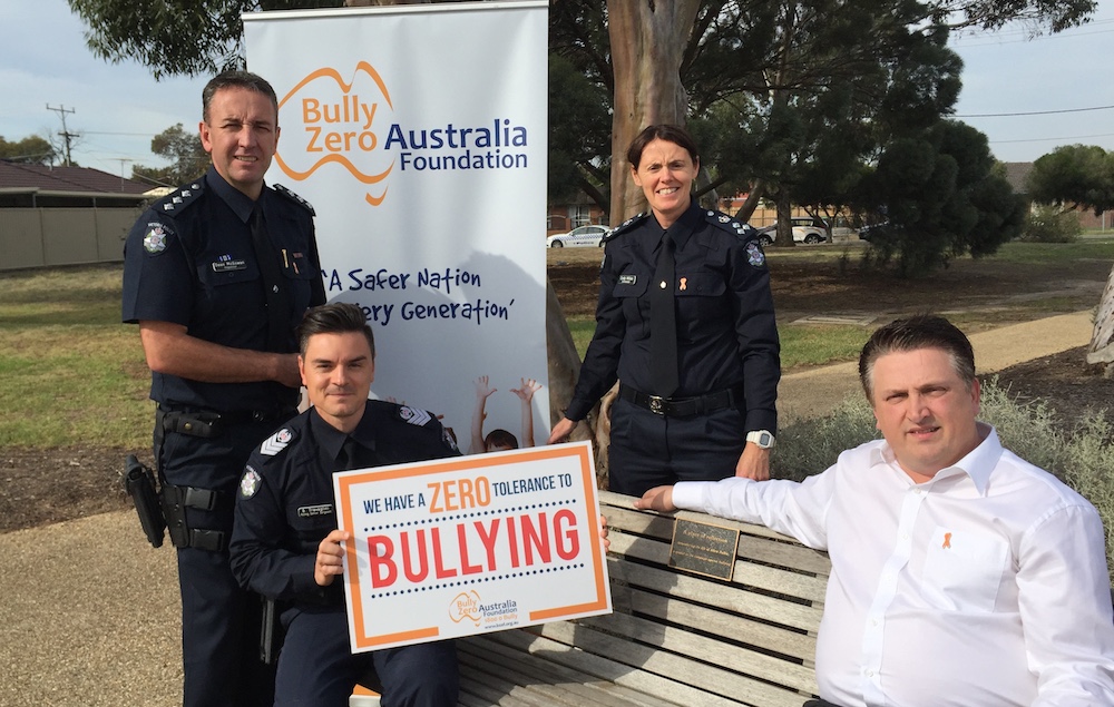 Ali Halkic with Senior Sergeant John Travaglini and Vic Police