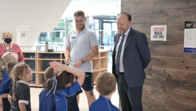 Principal Darren Lawson with staff and students