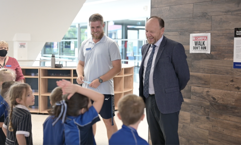 Principal Darren Lawson with staff and students