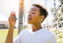 Child with asthma inhaler