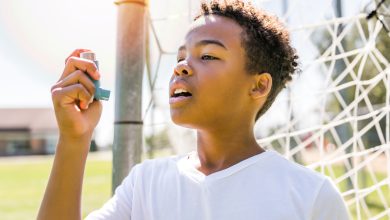 Child with asthma inhaler