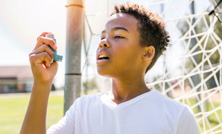 Child with asthma inhaler