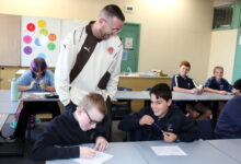 students in class with teacher